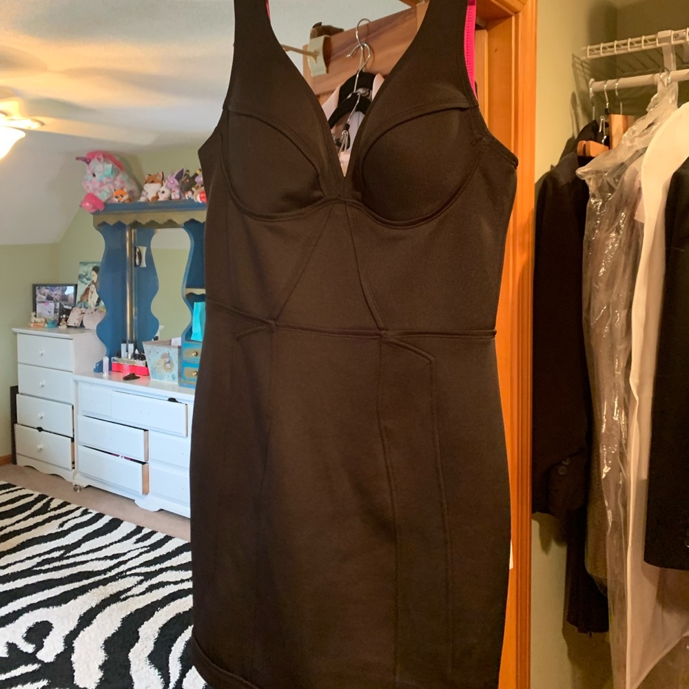 Bebe black (with hot pink lining) scuba dress with seam detail size medium